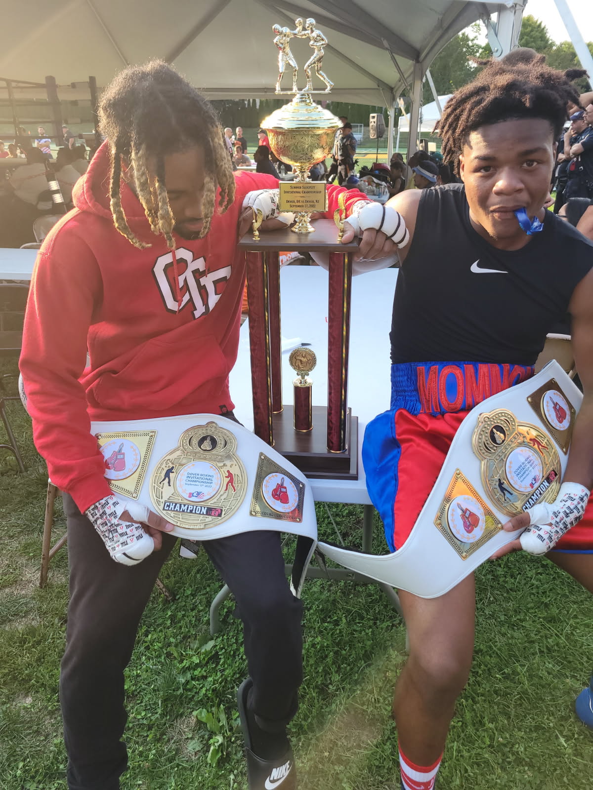 First State Boxing champions with championship belts — Delaware boxing gym